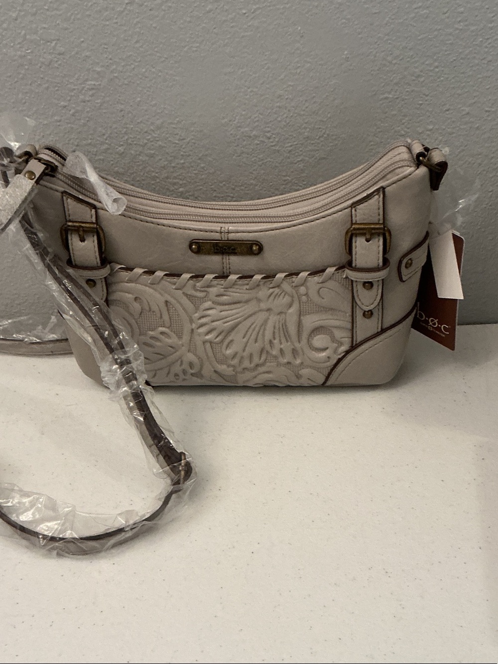 b.o.c. Cream Floral Embossed Crossbody with Braided Detail